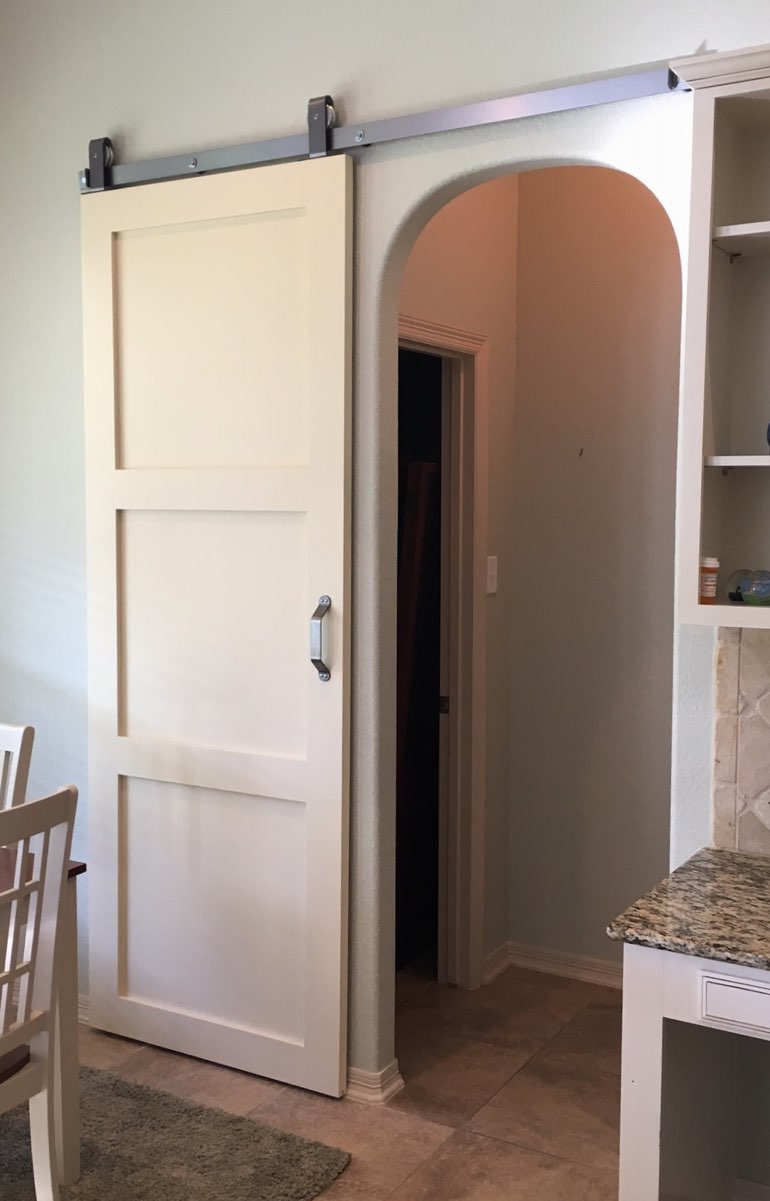 Contemporary style barn door in Jacksonville kitchen.